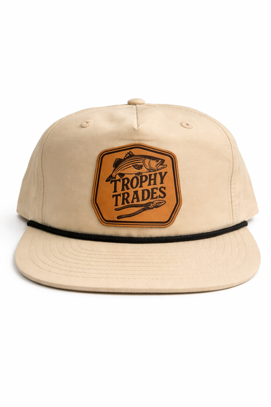 Beige cap with Trophy Trades logo on a white background